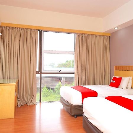 Oyo 89866 Houz Inn Бинтулу Екстериор снимка