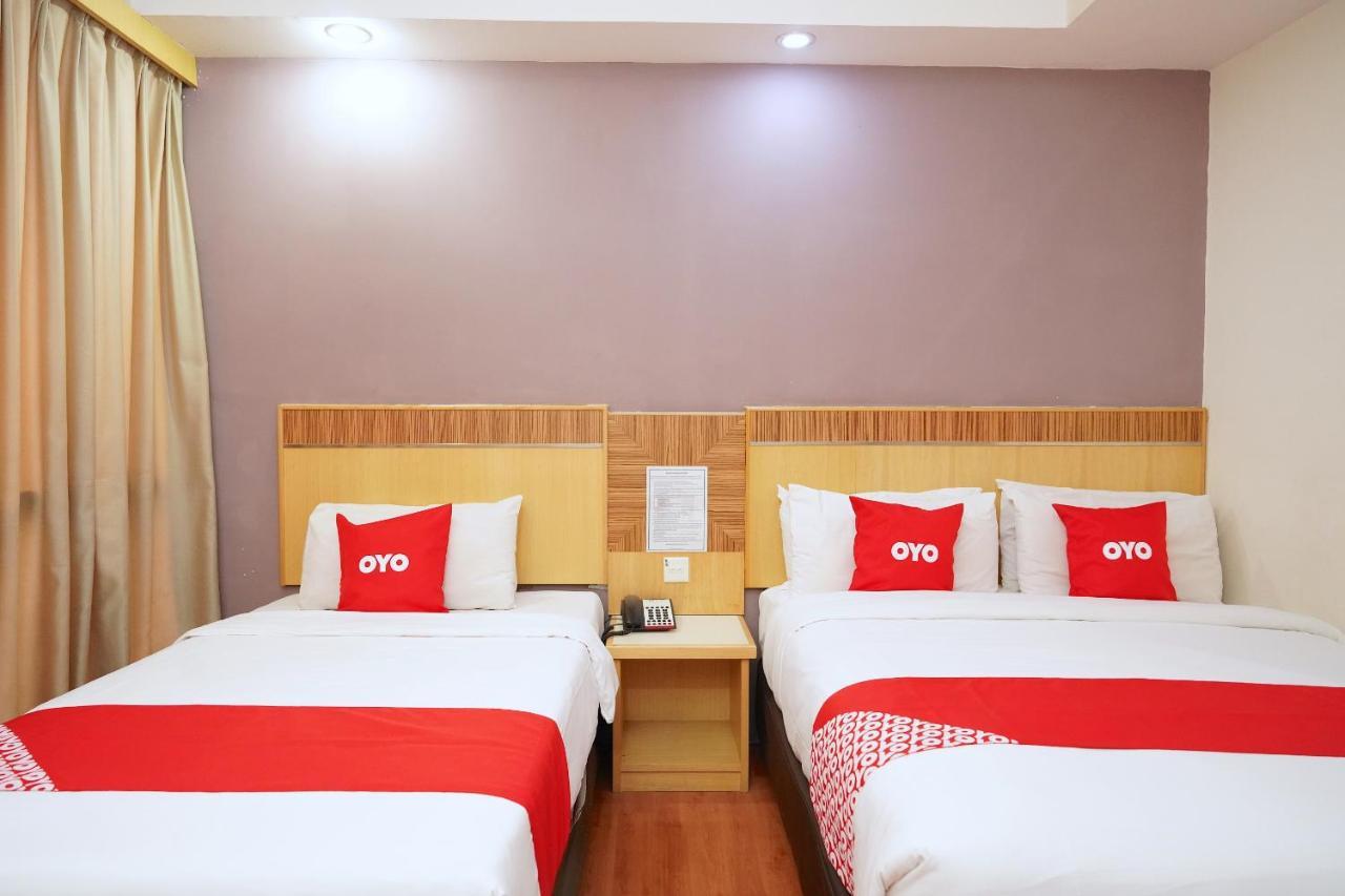 Oyo 89866 Houz Inn Бинтулу Екстериор снимка