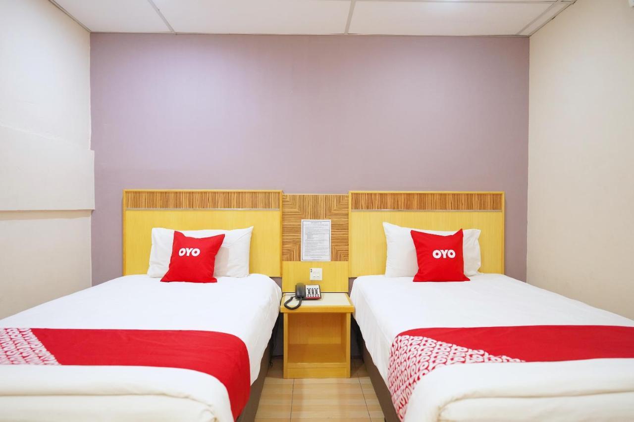 Oyo 89866 Houz Inn Бинтулу Екстериор снимка