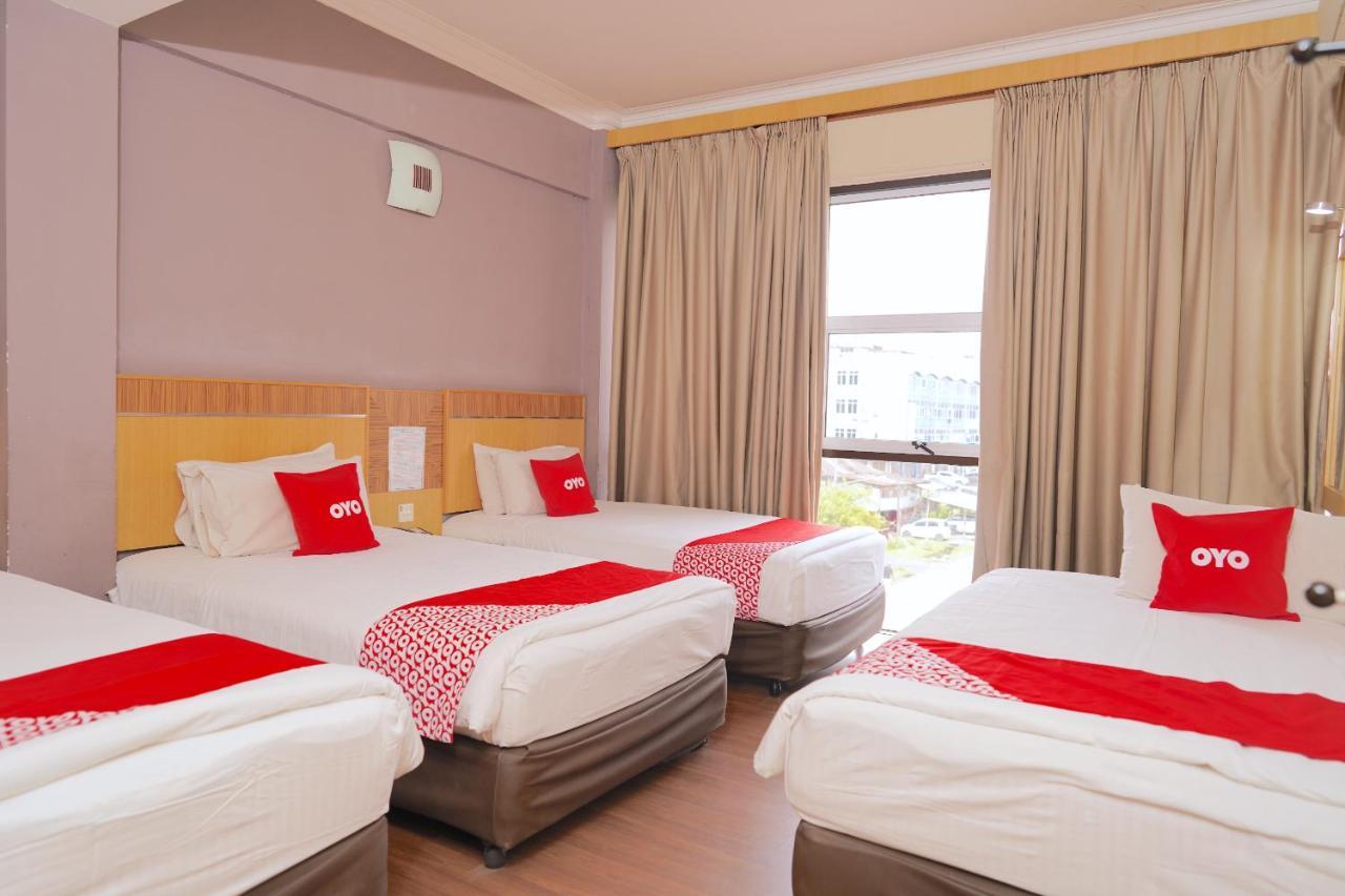 Oyo 89866 Houz Inn Бинтулу Екстериор снимка