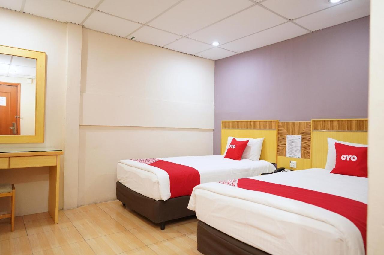 Oyo 89866 Houz Inn Бинтулу Екстериор снимка