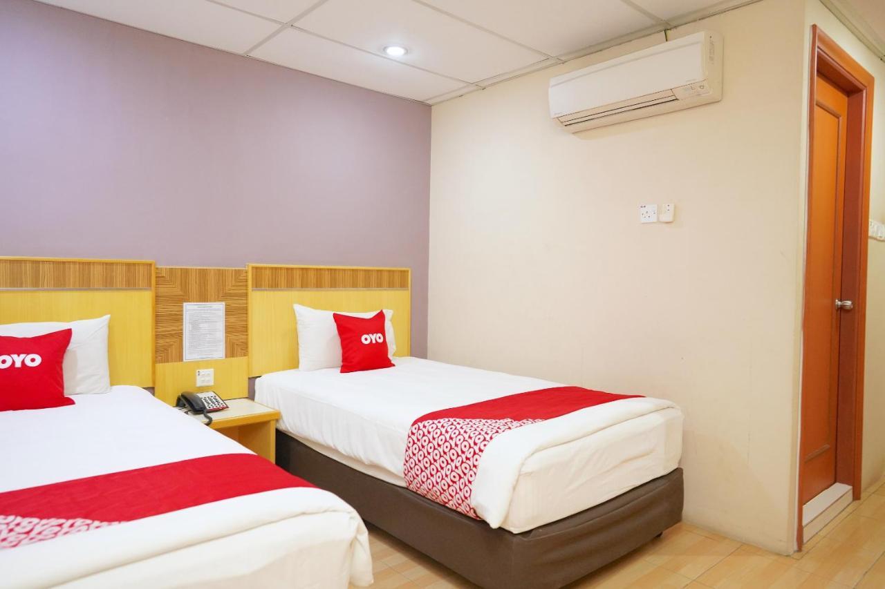 Oyo 89866 Houz Inn Бинтулу Екстериор снимка